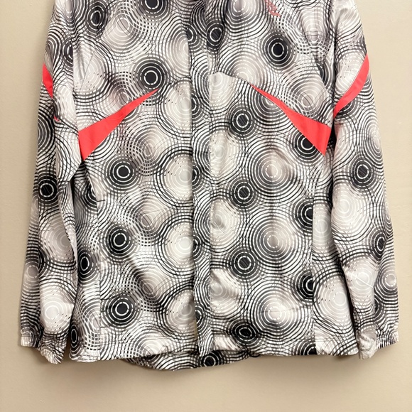 Saucony Black & White Circular Print Running Jacket w Coral Accents - Picture 7 of 15